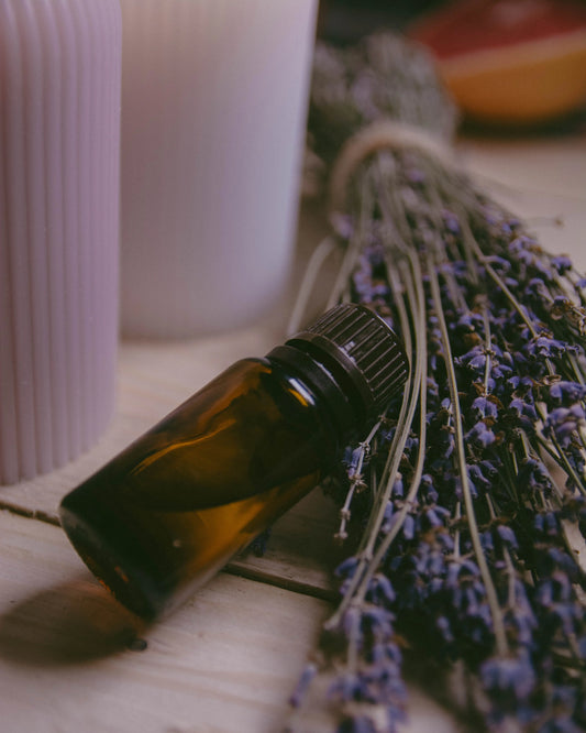 Herbal essential oil bottle with fresh lavender flowers – Herbal-Oils by Herbal Scent Candles & Co.