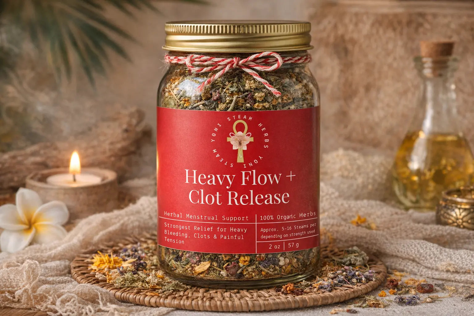 Jar of 'Heavy Flow + Clot Release' with a red label on a textured surface with flowers and candles.