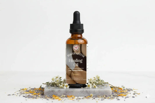 Healing oil for natural births on gray slate