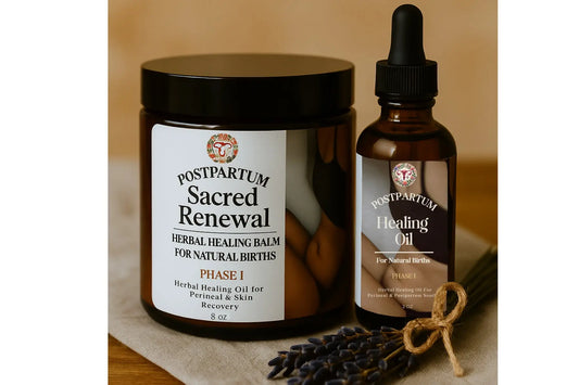 Postpartum Sacred Renewal herbal healing balm and oil on a wooden surface with a blurred background
